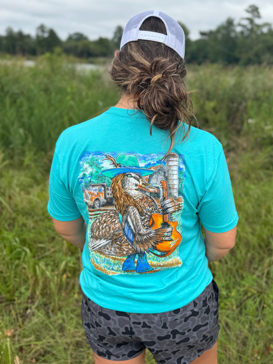 Back graphic of female character in bell bottoms and wide-brim hat with guitar—Lainey Bilson Tee by Combat Waterfowl.