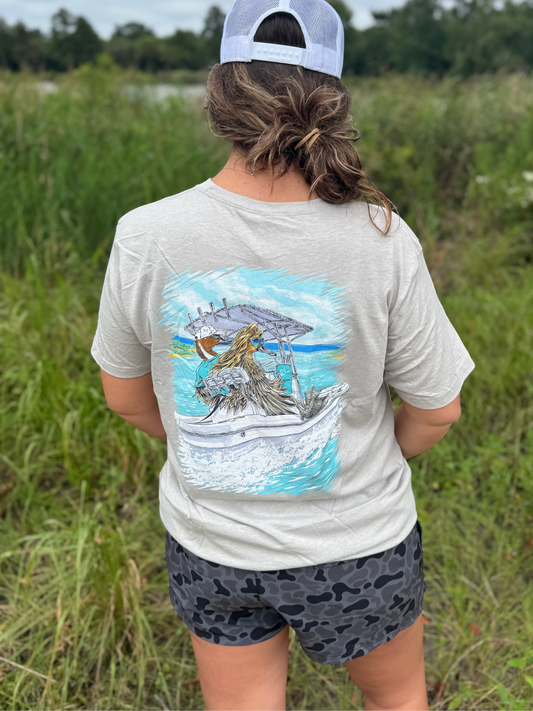 Back graphic of female character on a boat with Stanley® Cup beside her man — Stanley Duck Tee by Combat Waterfowl.