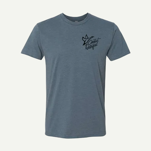 Heather blue Next Level tee with a black American Black Duck and "Combat Waterfowl" logo on the left chest.